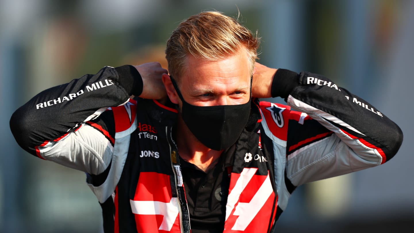 ABU DHABI, UNITED ARAB EMIRATES - DECEMBER 13: Kevin Magnussen of Denmark and Haas F1 adjusts his