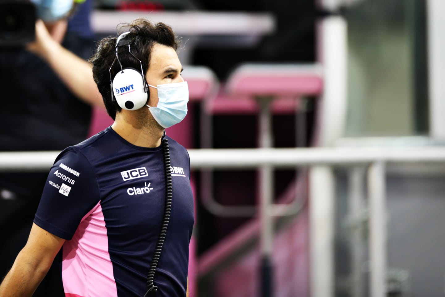 ABU DHABI, UNITED ARAB EMIRATES - DECEMBER 13: Sergio Perez of Mexico and Racing Point looks on from the pitlane after retiring during the F1 Grand Prix of Abu Dhabi at Yas Marina Circuit on December 13, 2020 in Abu Dhabi, United Arab Emirates. (Photo by Peter Fox/Getty Images)