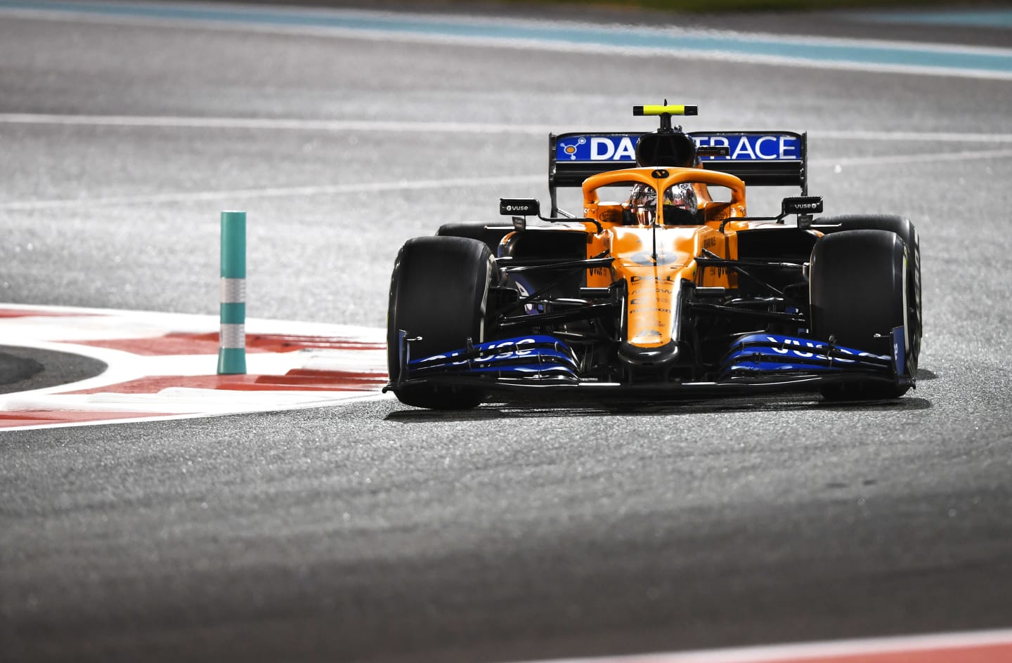 ABU DHABI, UNITED ARAB EMIRATES - DECEMBER 13: Lando Norris of Great Britain driving the (4)