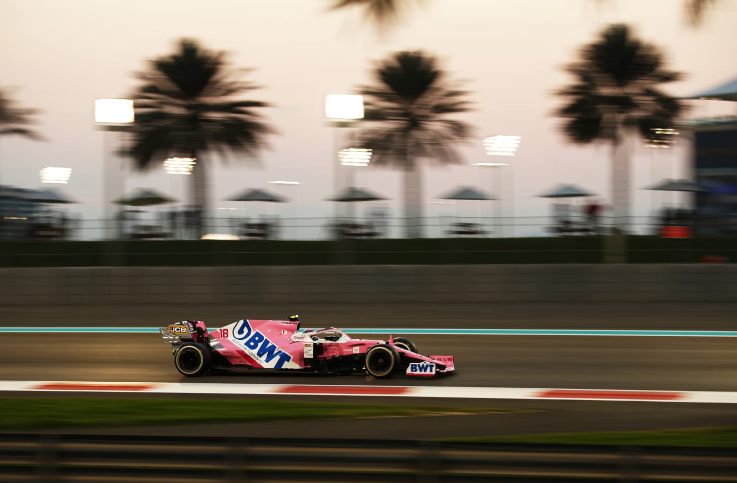 ABU DHABI, UNITED ARAB EMIRATES - DECEMBER 13: Lance Stroll of Canada driving the (18) Racing Point RP20 Mercedes during the F1 Grand Prix of Abu Dhabi at Yas Marina Circuit on December 13, 2020 in Abu Dhabi, United Arab Emirates. (Photo by Bryn Lennon/Getty Images)