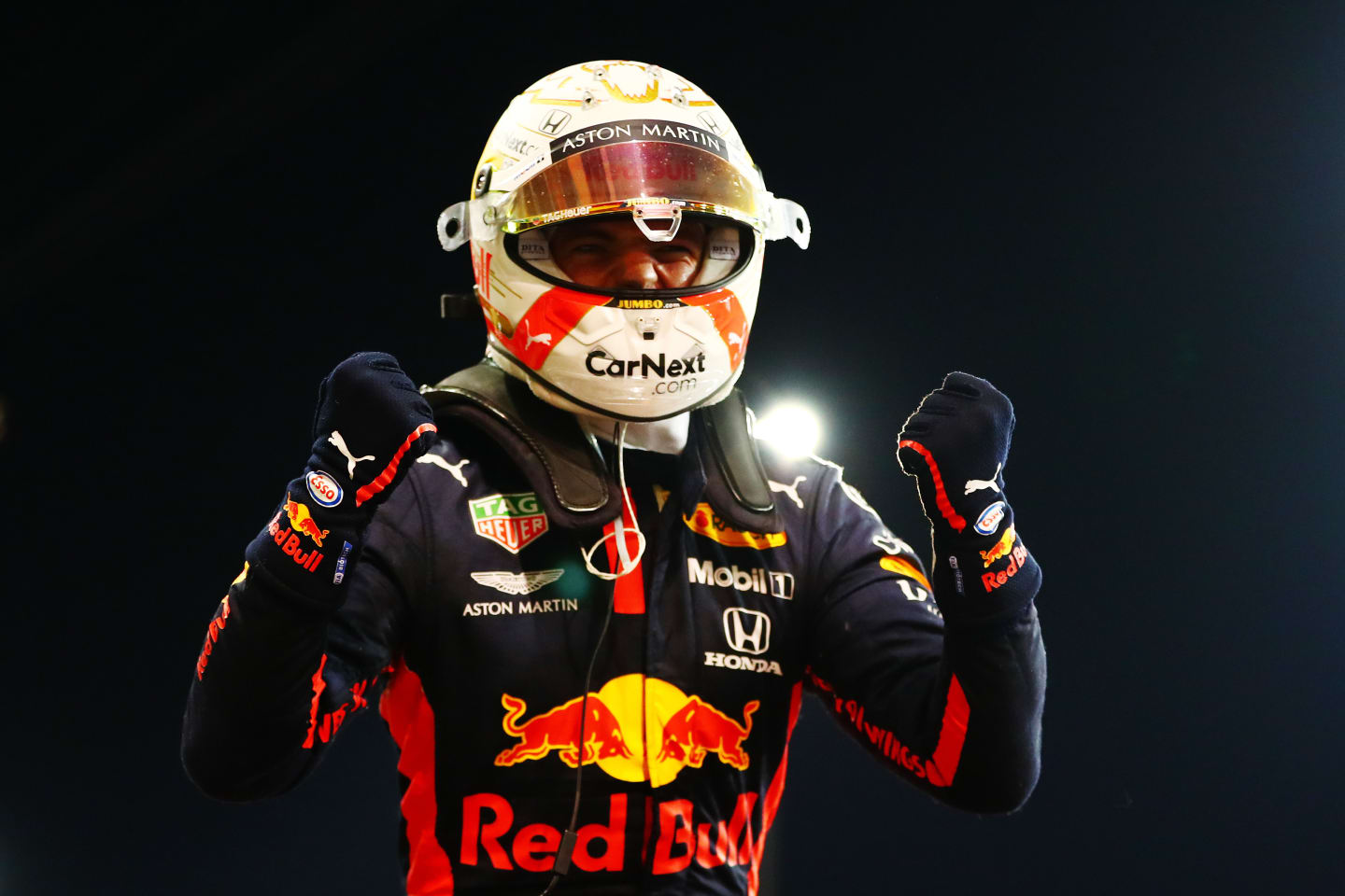 ABU DHABI, UNITED ARAB EMIRATES - DECEMBER 13: Race winner Max Verstappen of Netherlands and Red