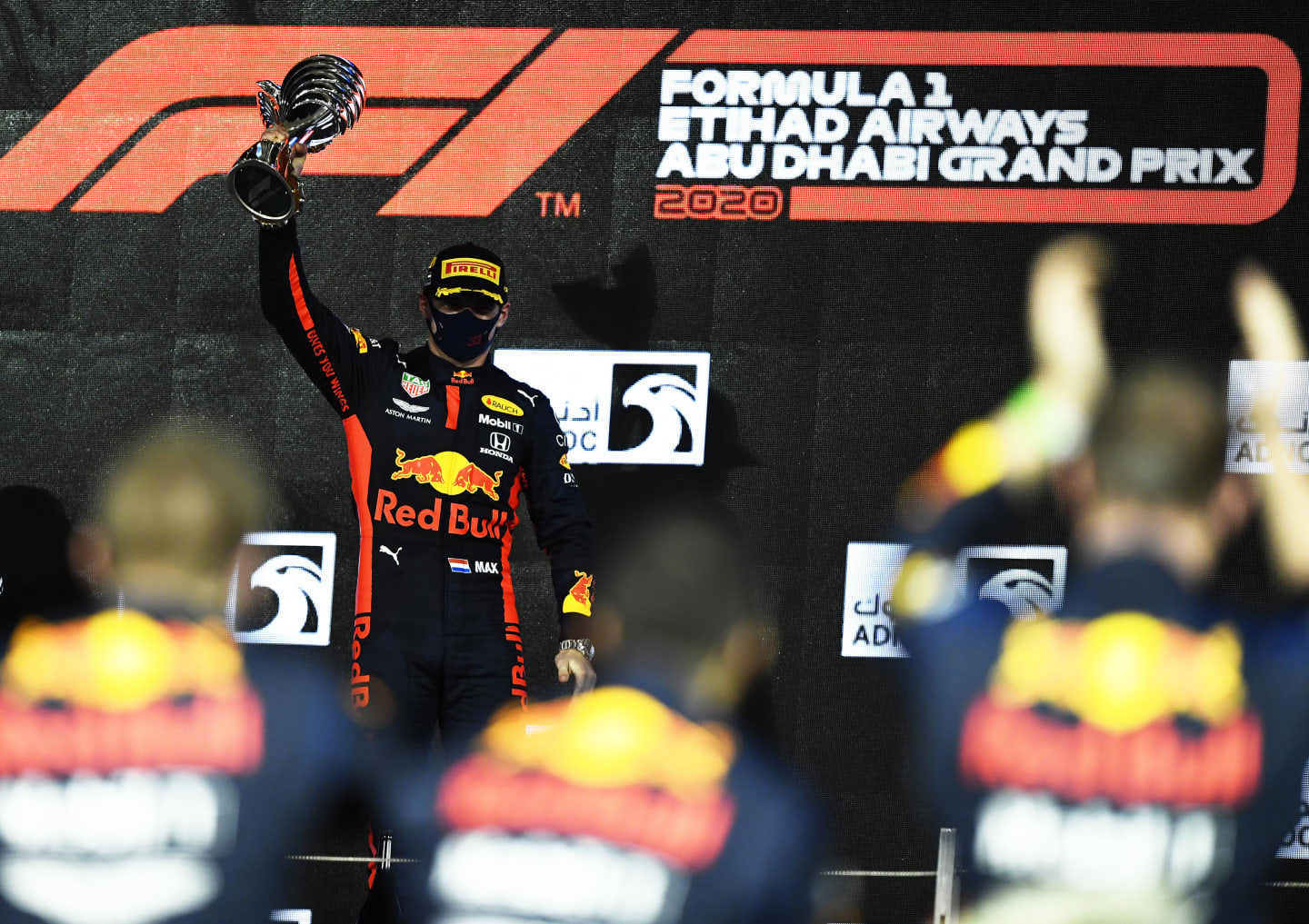 ABU DHABI, UNITED ARAB EMIRATES - DECEMBER 13: Race winner Max Verstappen of Netherlands and Red