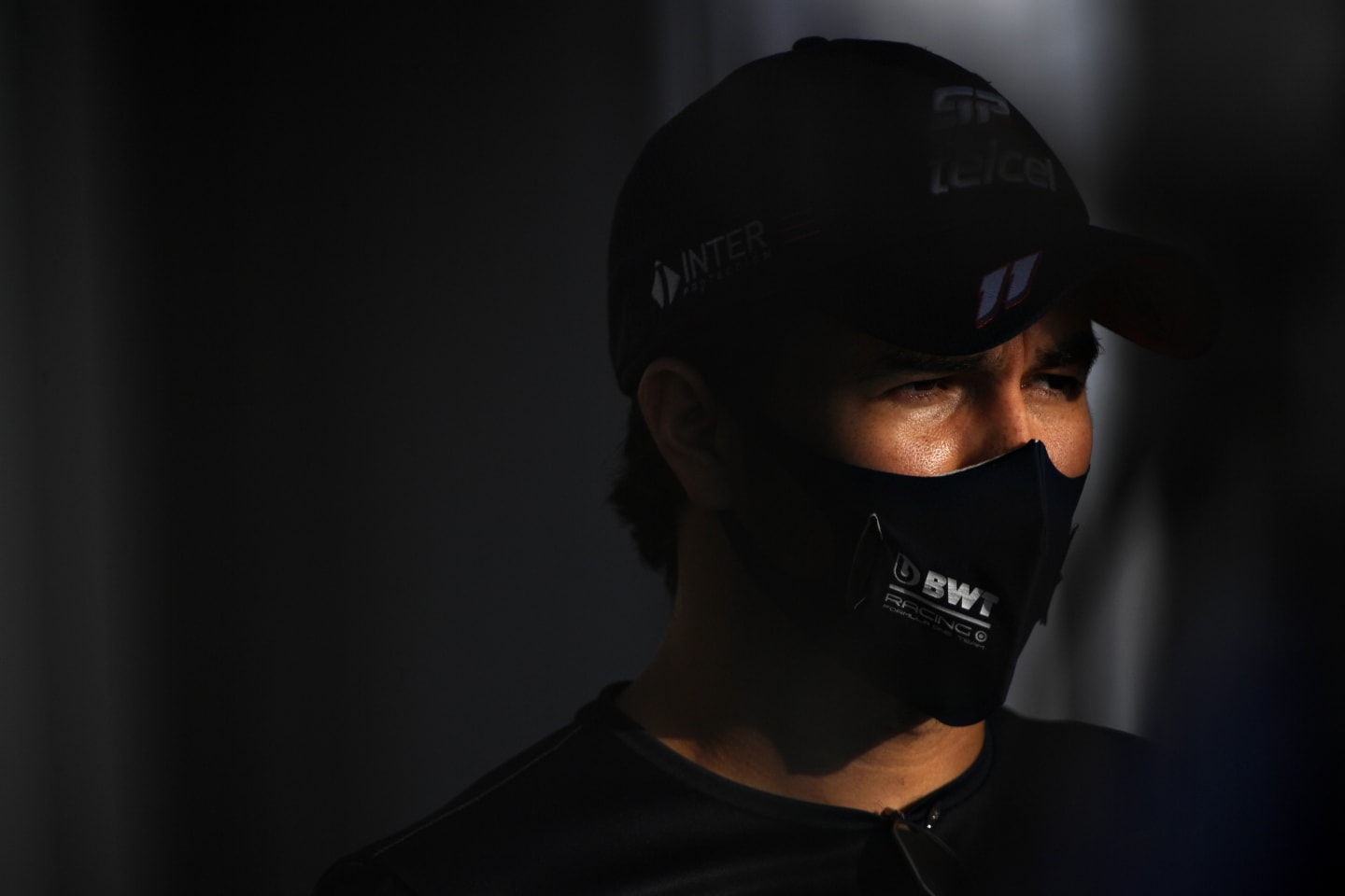 ABU DHABI, UNITED ARAB EMIRATES - DECEMBER 10: Sergio Perez of Mexico and Racing Point talks to the