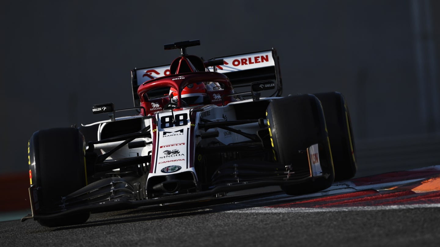 ABU DHABI, UNITED ARAB EMIRATES - DECEMBER 15: Robert Kubica of Poland driving the (88) Alfa Romeo