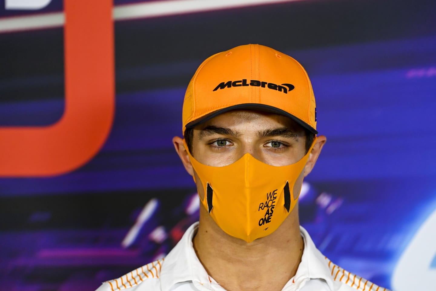 ABU DHABI, UNITED ARAB EMIRATES - DECEMBER 10: Lando Norris of Great Britain and McLaren F1 talks