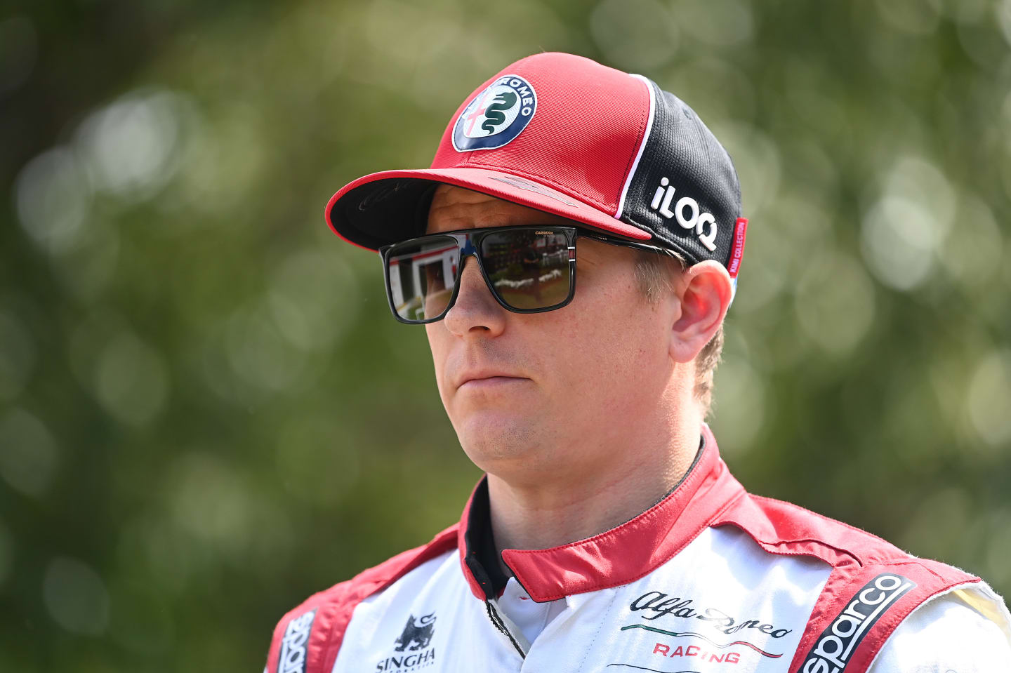 MELBOURNE, AUSTRALIA - MARCH 12: Kimi Raikkonen of Finland and Alfa Romeo Racing looks on in the