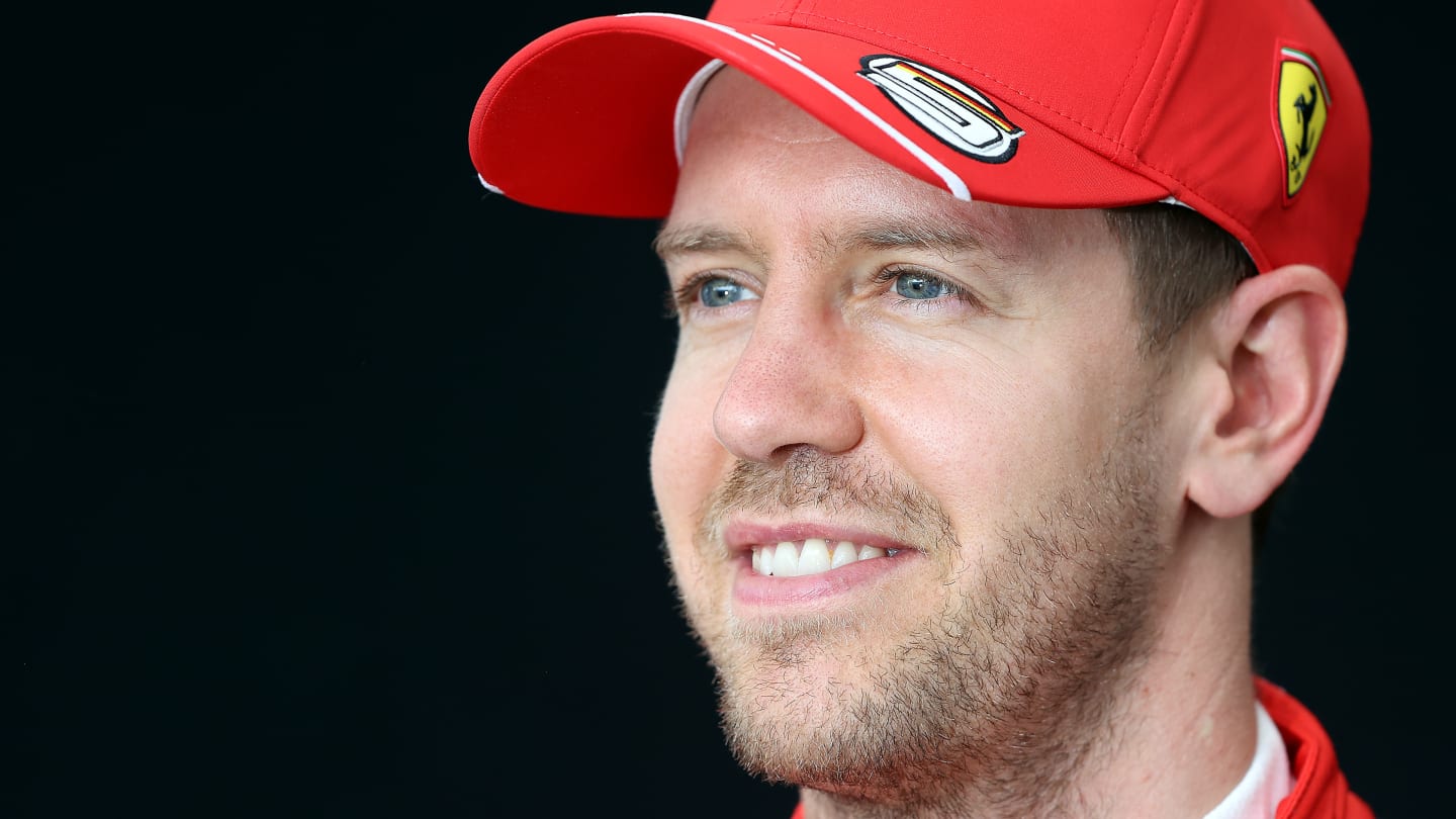 MELBOURNE, AUSTRALIA - MARCH 12: Sebastian Vettel of Germany and Ferrari poses for a photo in the