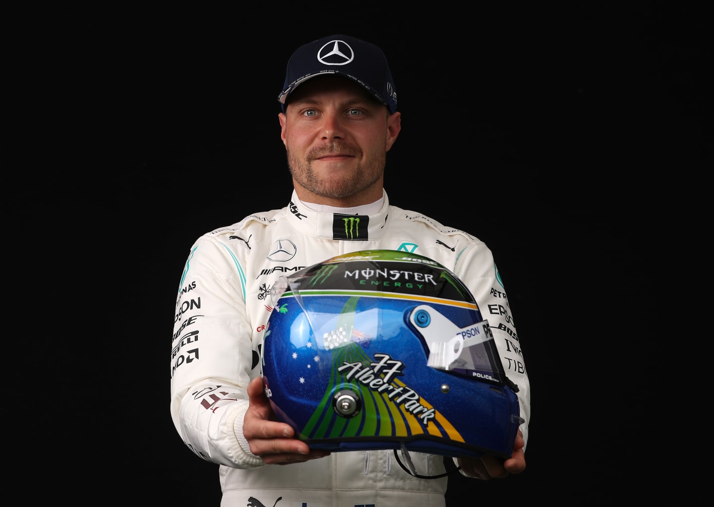 MELBOURNE, AUSTRALIA - MARCH 12: Valtteri Bottas of Finland and Mercedes GP poses for a photo in