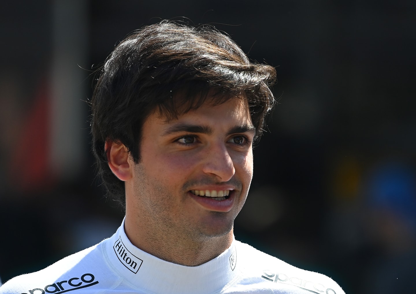 MELBOURNE, AUSTRALIA - MARCH 12: Carlos Sainz of Spain and McLaren F1 looks on in the Paddock