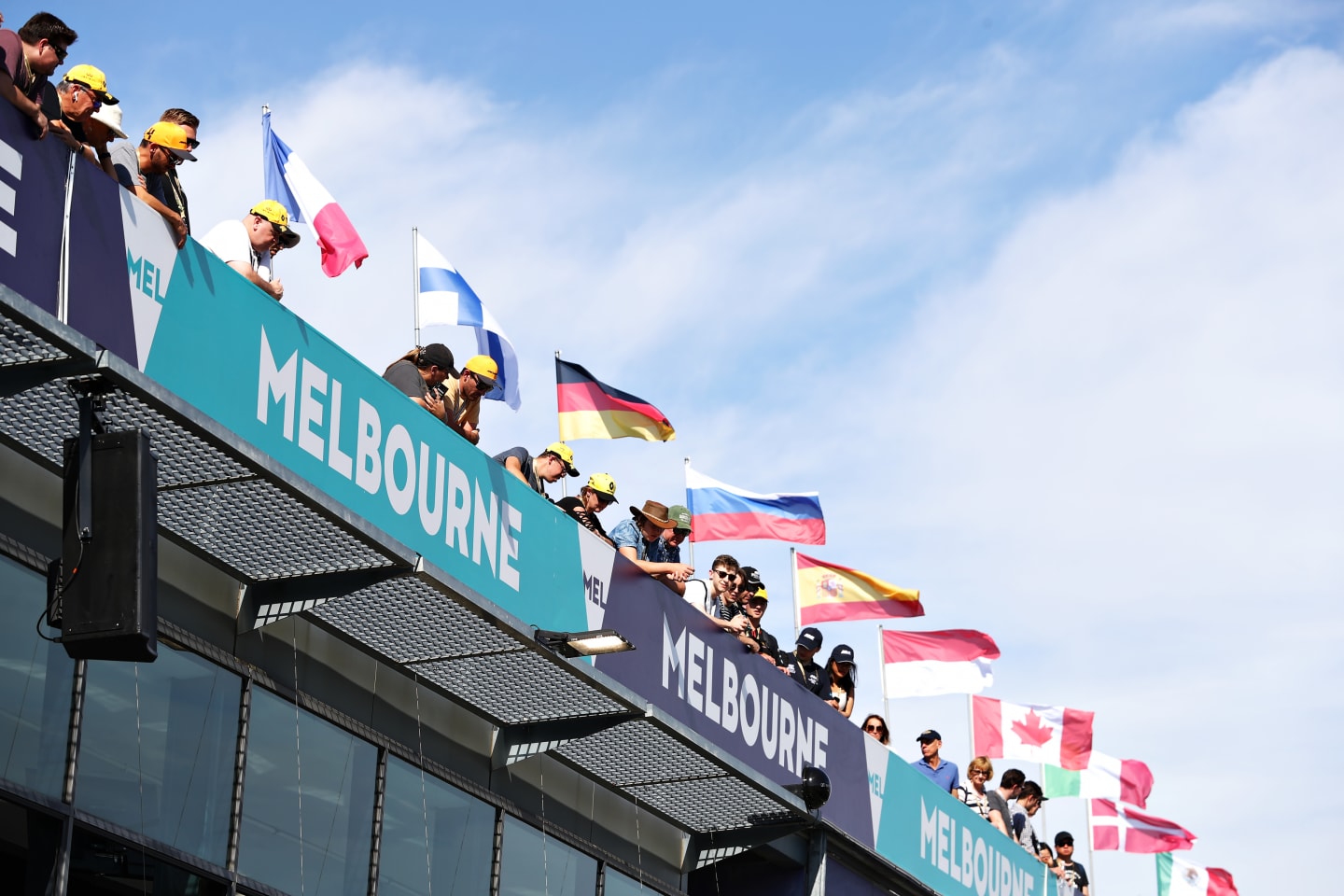 MELBOURNE, AUSTRALIA - MARCH 12: Fans watch over from above the pitlane during previews ahead of