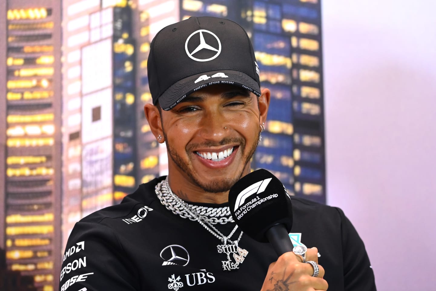 MELBOURNE, AUSTRALIA - MARCH 12: Lewis Hamilton of Great Britain and Mercedes GP reacts during a