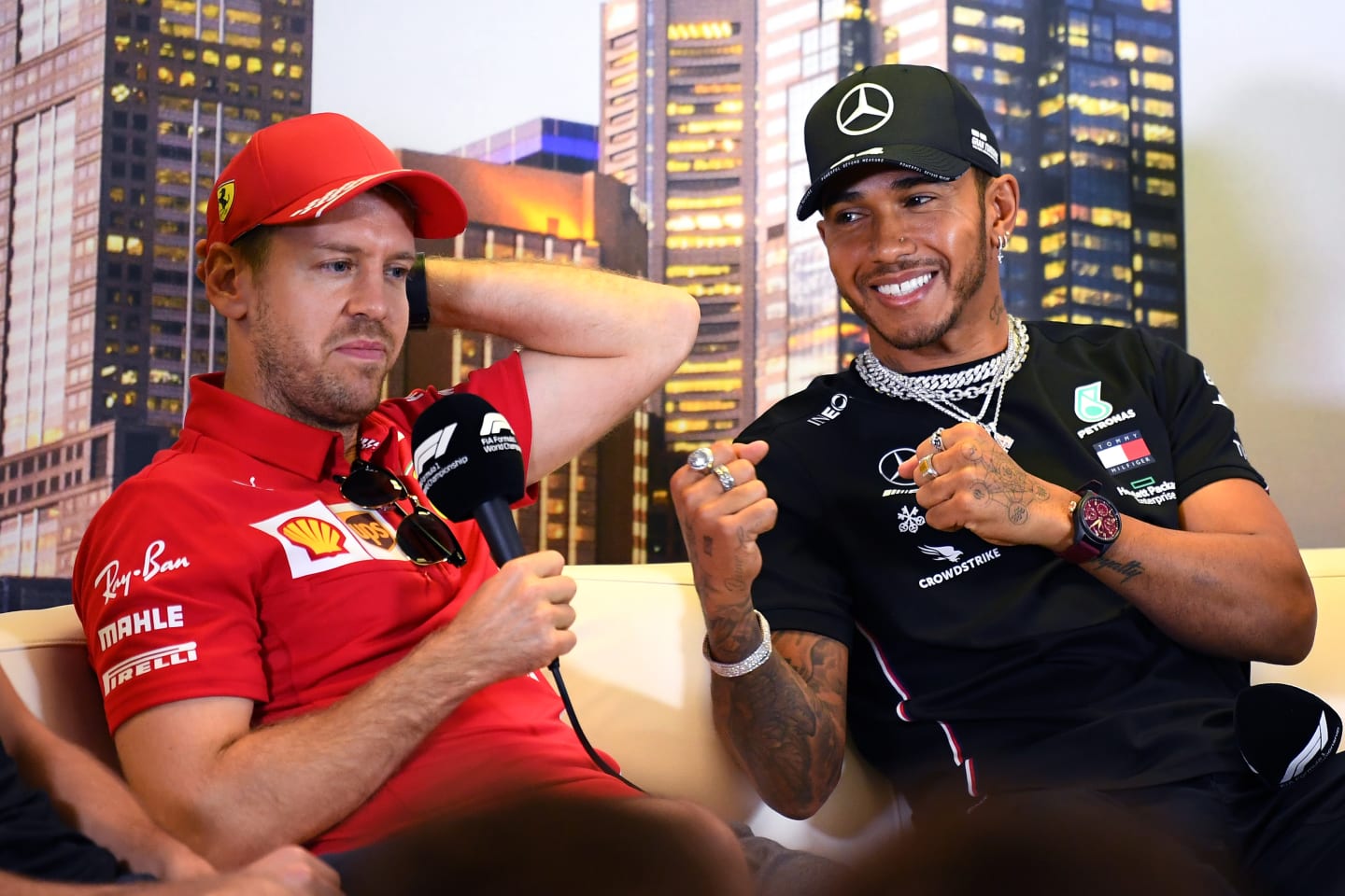 MELBOURNE, AUSTRALIA - MARCH 12: Lewis Hamilton of Great Britain and Mercedes GP and Sebastian