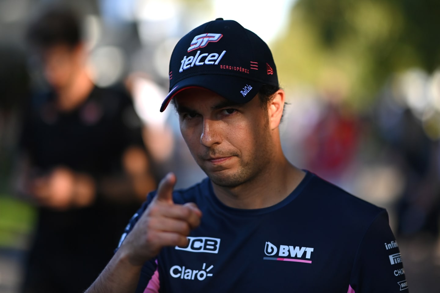 MELBOURNE, AUSTRALIA - MARCH 12: Sergio Perez of Mexico and Racing Point walks in the paddock