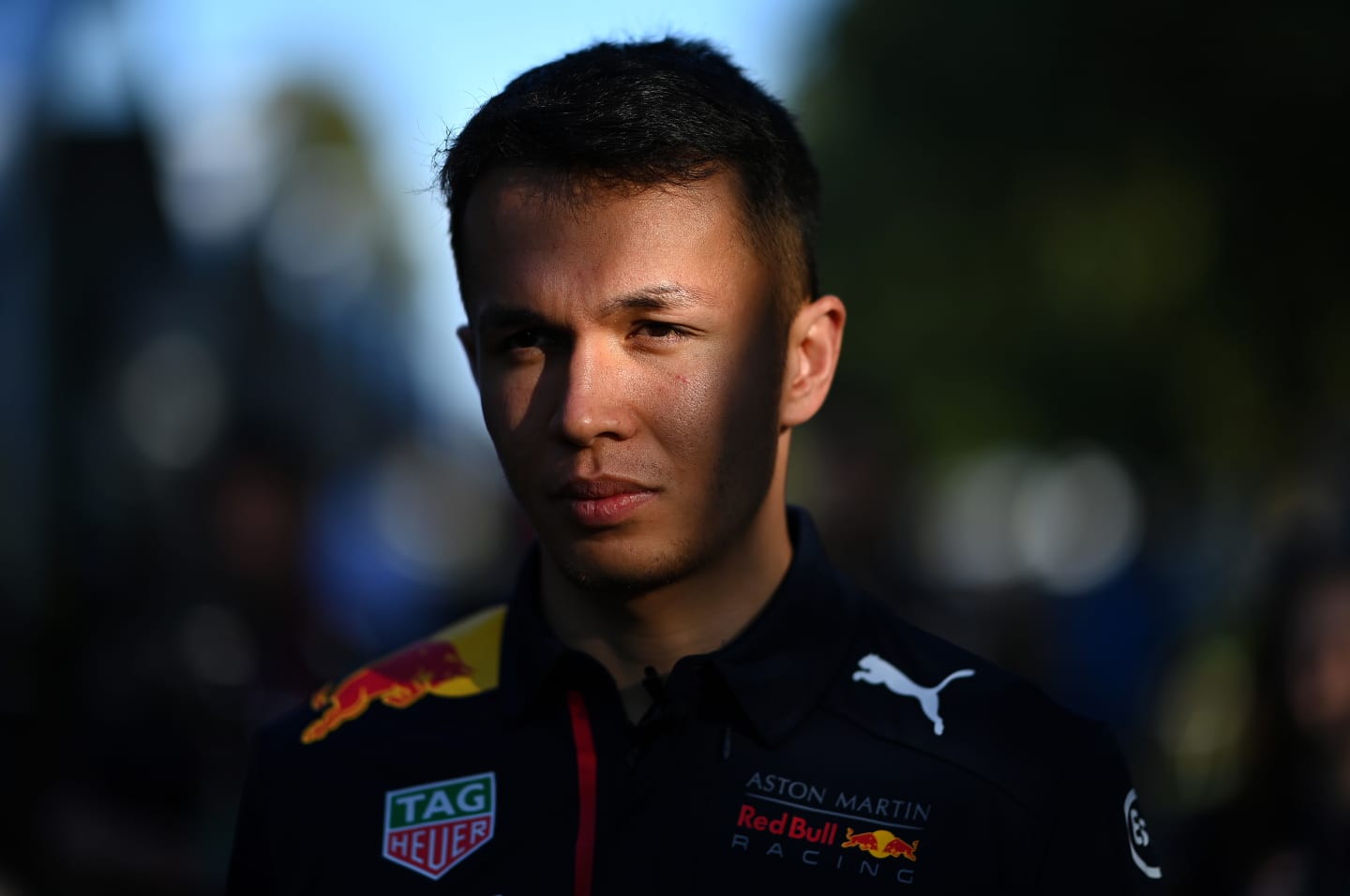 MELBOURNE, AUSTRALIA - MARCH 12: Alexander Albon of Thailand and Red Bull Racing looks on in the