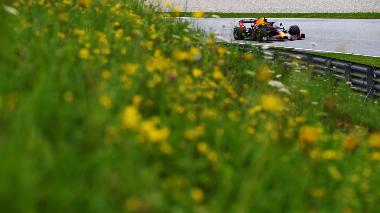 SPIELBERG, AUSTRIA - JULY 03: Alexander Albon of Thailand driving the (23) Aston Martin Red Bull Racing RB16 on track during practice for the F1 Grand Prix of Austria at Red Bull Ring on July 03, 2020 in Spielberg, Austria. (Photo by Clive Mason - Formula 1/Formula 1 via Getty Images)