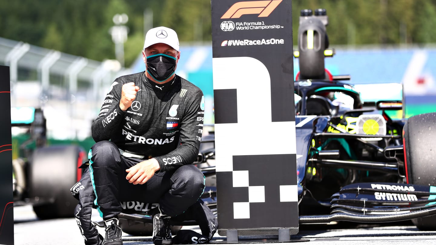 SPIELBERG, AUSTRIA - JULY 04: Pole position qualifier Valtteri Bottas of Finland and Mercedes GP celebrates in parc ferme during qualifying for the Formula One Grand Prix of Austria at Red Bull Ring on July 04, 2020 in Spielberg, Austria. (Photo by Dan Istitene - Formula 1/Formula 1 via Getty Images)