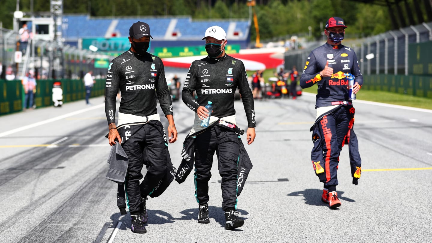 SPIELBERG, AUSTRIA - JULY 04: Lewis Hamilton of Great Britain and Mercedes GP talks with Valtteri