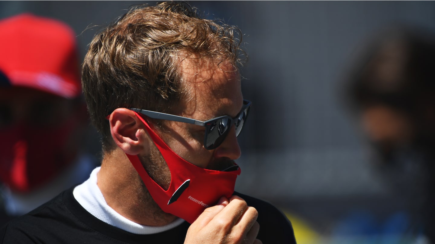 SPIELBERG, AUSTRIA - JULY 05: Sebastian Vettel of Germany and Ferrari looks on during the Formula