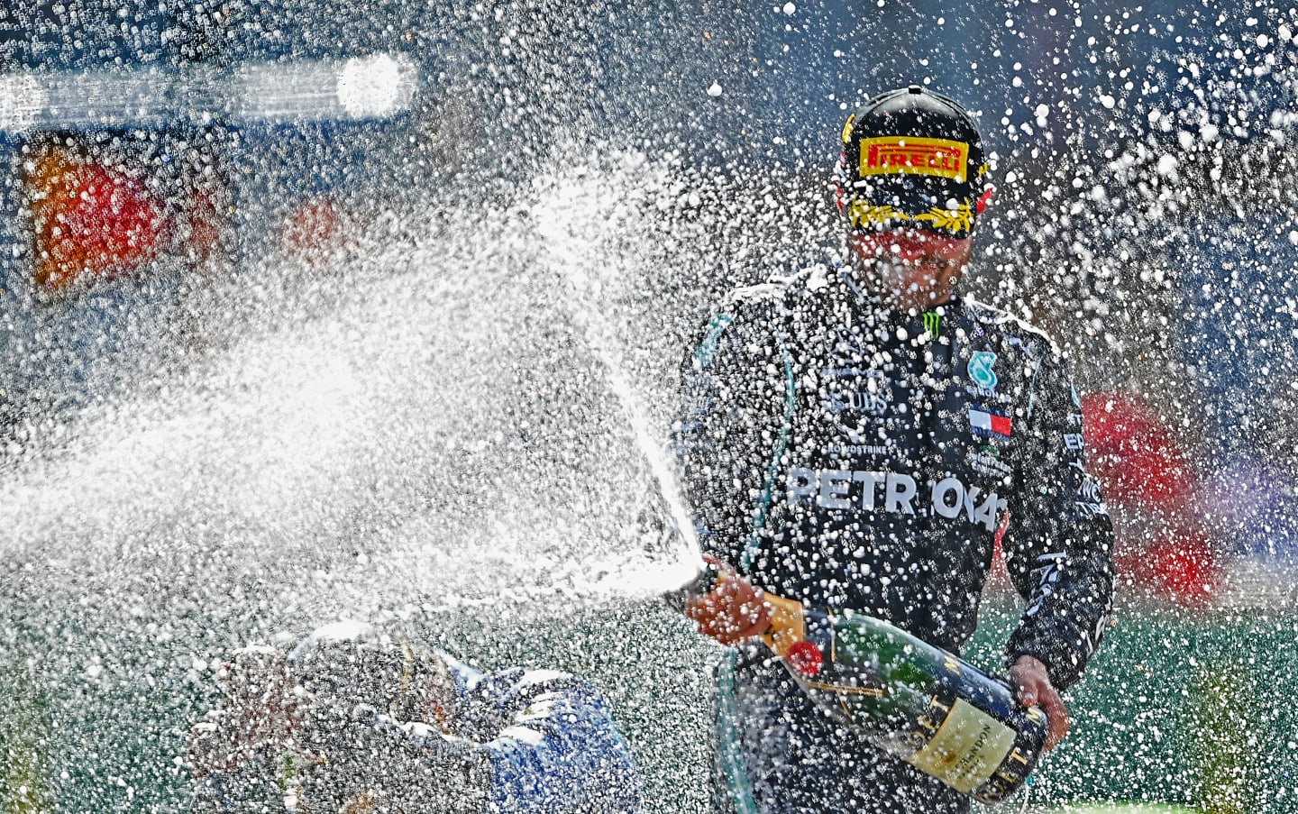 SPIELBERG, AUSTRIA - JULY 05:  Race winner Valtteri Bottas of Finland and Mercedes GP celebrates on the podium during the Formula One Grand Prix of Austria at Red Bull Ring on July 05, 2020 in Spielberg, Austria. (Photo by Clive Mason - Formula 1/Formula 1 via Getty Images)