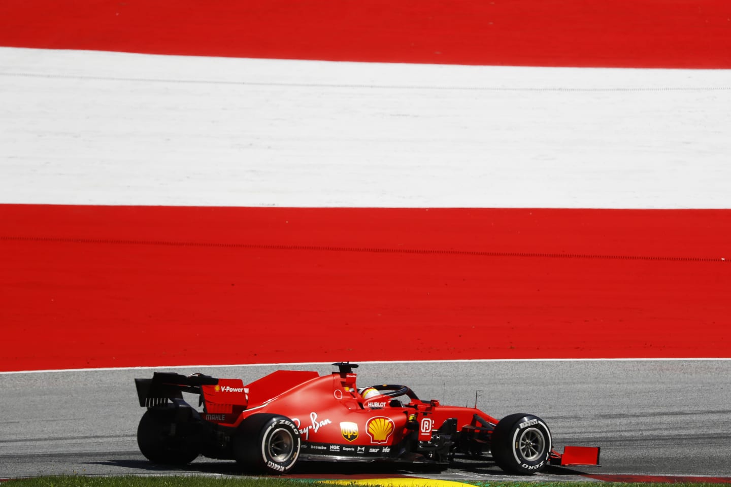 SPIELBERG, AUSTRIA - JULY 05: Sebastian Vettel of Germany driving the (5) Scuderia Ferrari SF1000