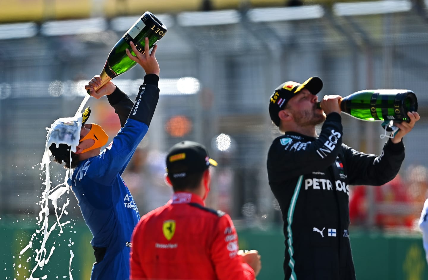 SPIELBERG, AUSTRIA - JULY 05: Third placed Lando Norris of Great Britain and McLaren F1 celebrates on the podium during the Formula One Grand Prix of Austria at Red Bull Ring on July 05, 2020 in Spielberg, Austria. (Photo by Clive Mason - Formula 1/Formula 1 via Getty Images)