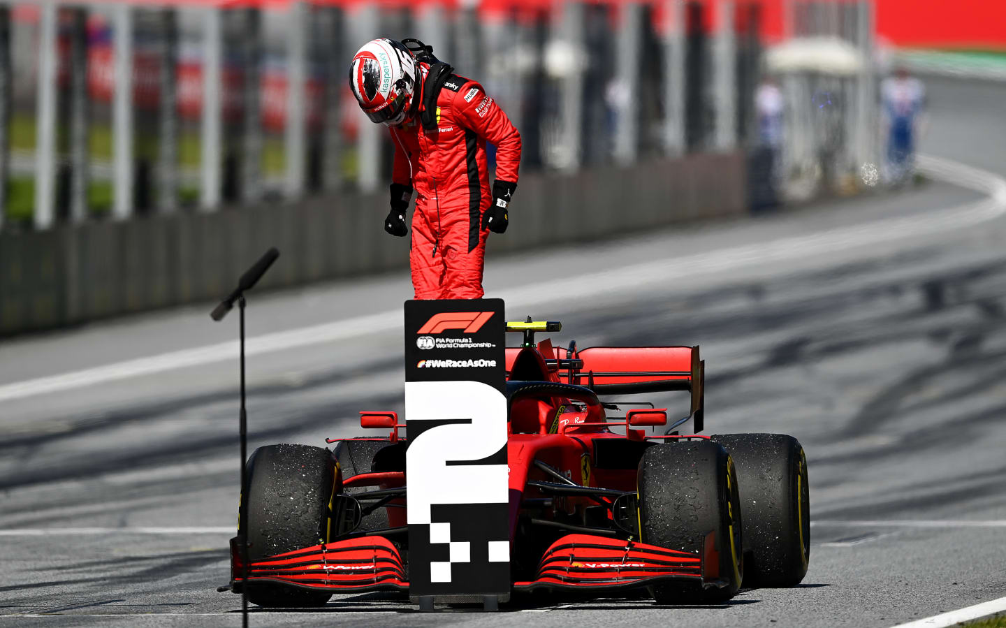 SPIELBERG, AUSTRIA - JULY 05: Second placed Charles Leclerc of Monaco and Ferrari gets out of his car during the Formula One Grand Prix of Austria at Red Bull Ring on July 05, 2020 in Spielberg, Austria. (Photo by Clive Mason - Formula 1/Formula 1 via Getty Images)