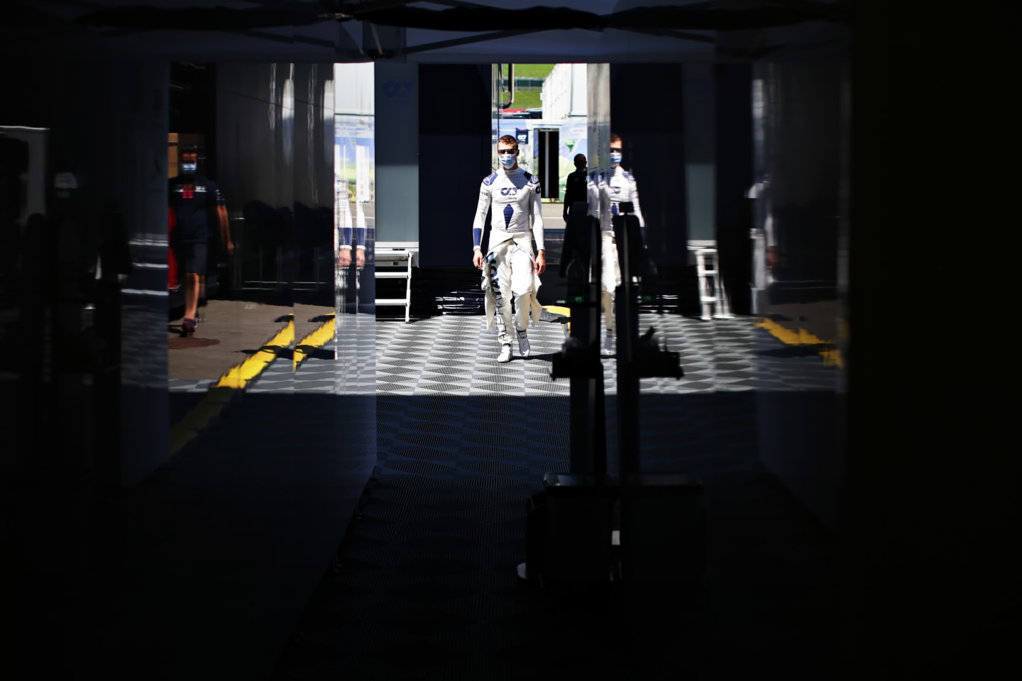 SPIELBERG, AUSTRIA - JULY 05: Daniil Kvyat of Russia and Scuderia AlphaTauri walks to the garage before the Formula One Grand Prix of Austria at Red Bull Ring on July 05, 2020 in Spielberg, Austria. (Photo by Peter Fox/Getty Images)
