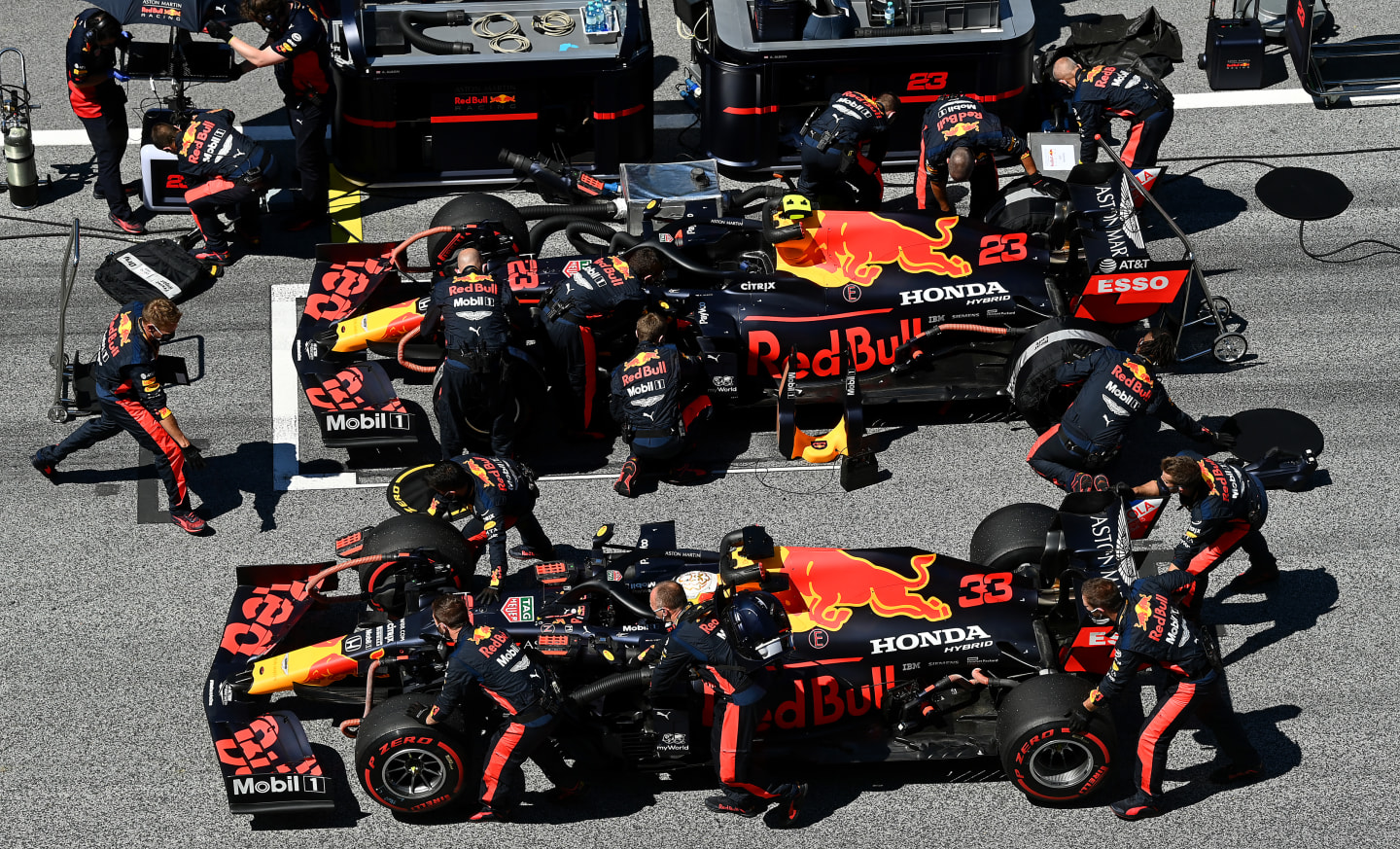 SPIELBERG, AUSTRIA - JULY 05: Alexander Albon of Thailand driving the (23) Aston Martin Red Bull Racing RB16 and Max Verstappen of the Netherlands driving the (33) Aston Martin Red Bull Racing RB16 prepare on the grid during the Formula One Grand Prix of Austria at Red Bull Ring on July 05, 2020 in Spielberg, Austria. (Photo by Clive Mason - Formula 1/Formula 1 via Getty Images)