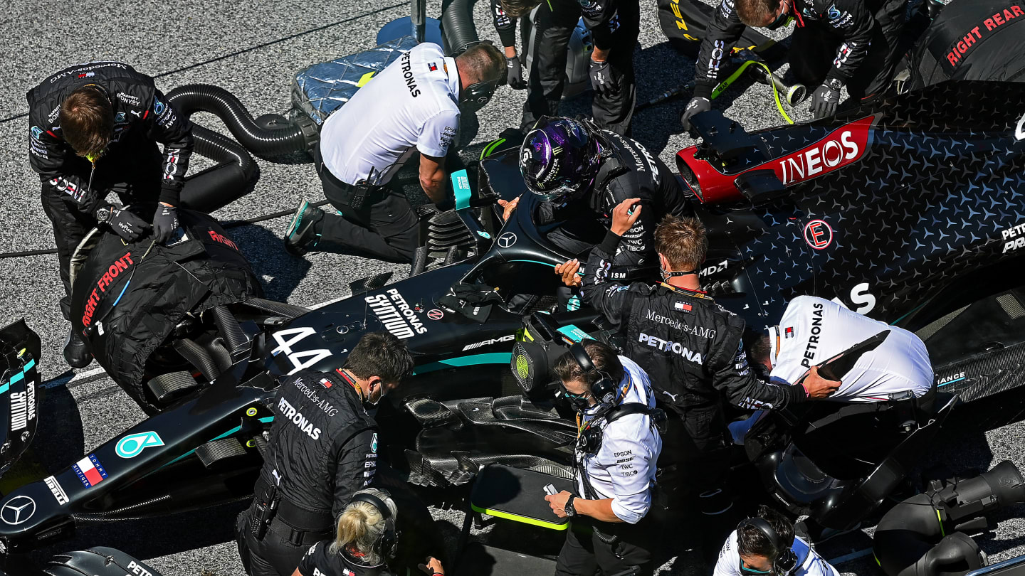 SPIELBERG, AUSTRIA - JULY 05: Lewis Hamilton of Great Britain and Mercedes GP leaves his car during