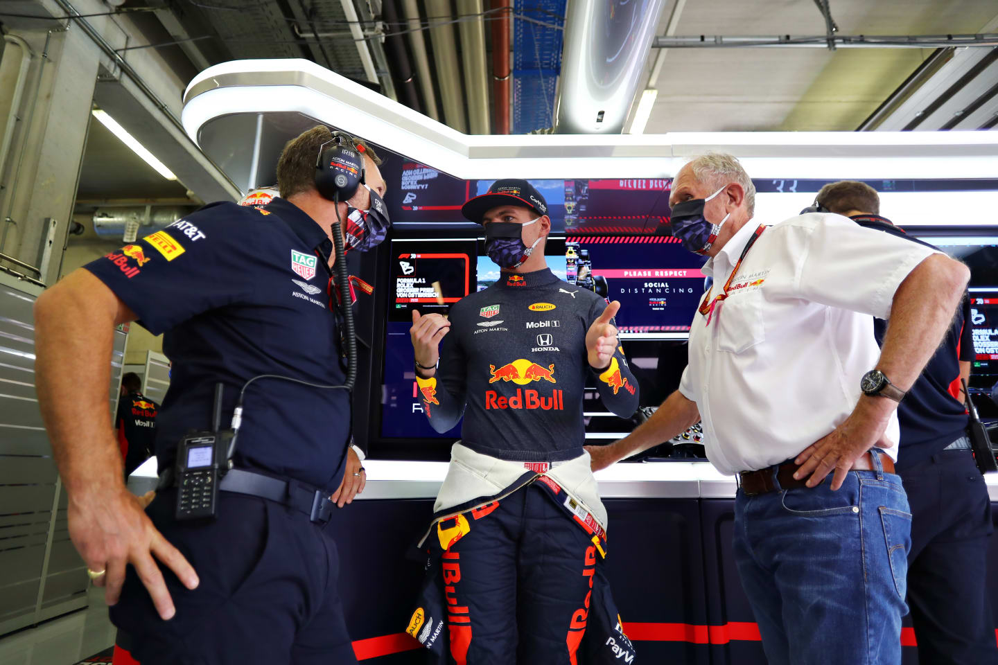 SPIELBERG, AUSTRIA - JULY 05: Max Verstappen of Netherlands and Red Bull Racing talks with Red Bull