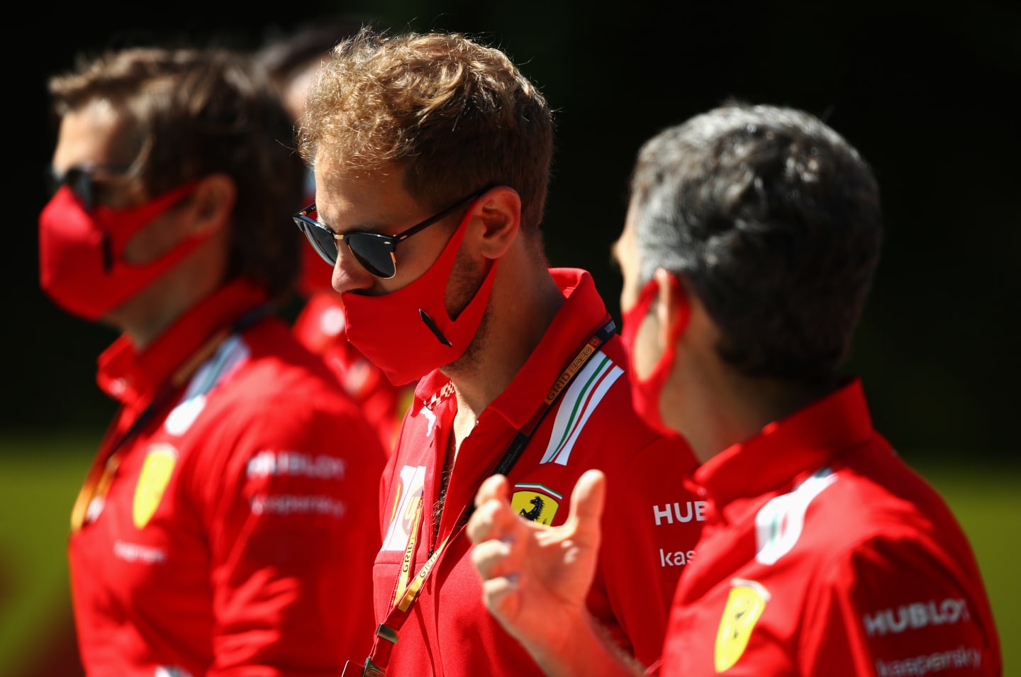 SPIELBERG, AUSTRIA - JULY 02: Sebastian Vettel of Germany and Ferrari walks the track with