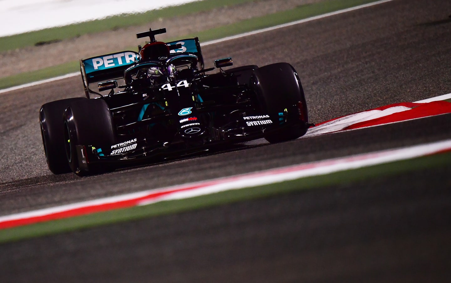 BAHRAIN, BAHRAIN - NOVEMBER 27: Lewis Hamilton of Great Britain driving the (44) Mercedes AMG Petronas F1 Team Mercedes W11 on track during practice ahead of the F1 Grand Prix of Bahrain at Bahrain International Circuit on November 27, 2020 in Bahrain, Bahrain. (Photo by Giuseppe Cacace - Pool/Getty Images)