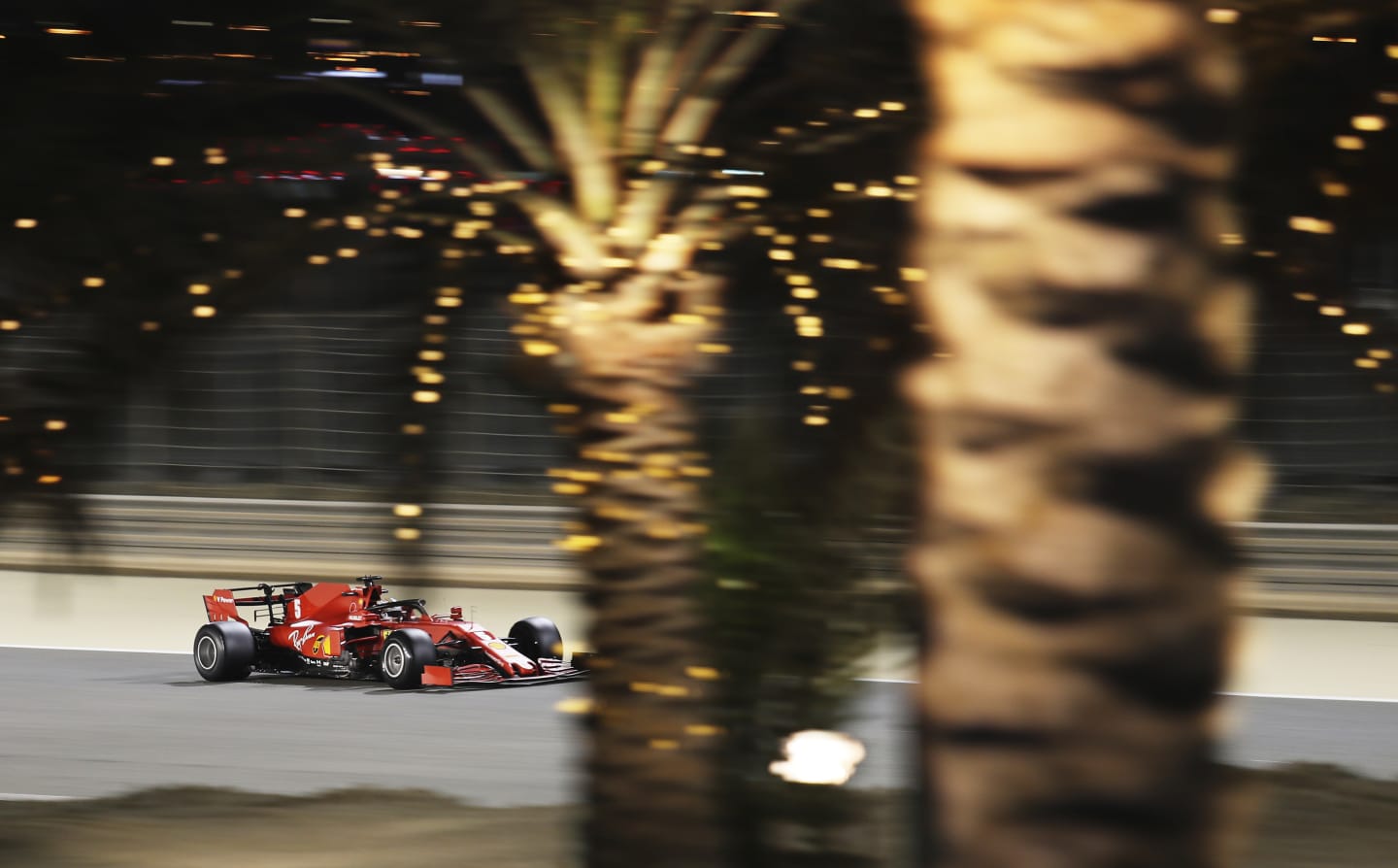 BAHRAIN, BAHRAIN - NOVEMBER 27: Sebastian Vettel of Germany driving the (5) Scuderia Ferrari SF1000 on track during practice ahead of the F1 Grand Prix of Bahrain at Bahrain International Circuit on November 27, 2020 in Bahrain, Bahrain. (Photo by Kamran Jebreili - Pool/Getty Images)