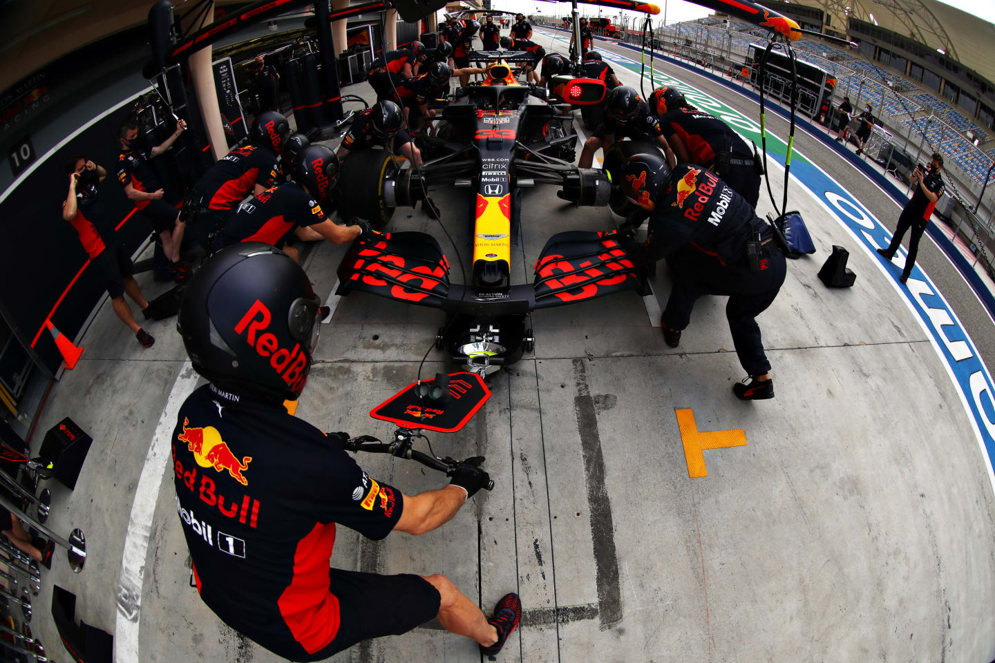 BAHRAIN, BAHRAIN - NOVEMBER 28: The Red Bull Racing team practice pitstops before final practice