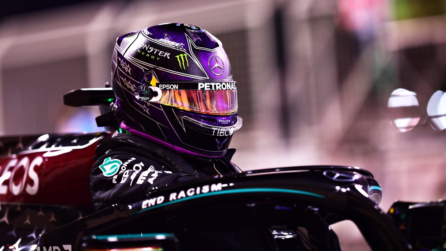 BAHRAIN, BAHRAIN - NOVEMBER 28: Pole position qualifier Lewis Hamilton of Great Britain and Mercedes GP climbs out of his car in parc ferme during qualifying ahead of the F1 Grand Prix of Bahrain at Bahrain International Circuit on November 28, 2020 in Bahrain, Bahrain. (Photo by Mario Renzi - Formula 1/Formula 1 via Getty Images)