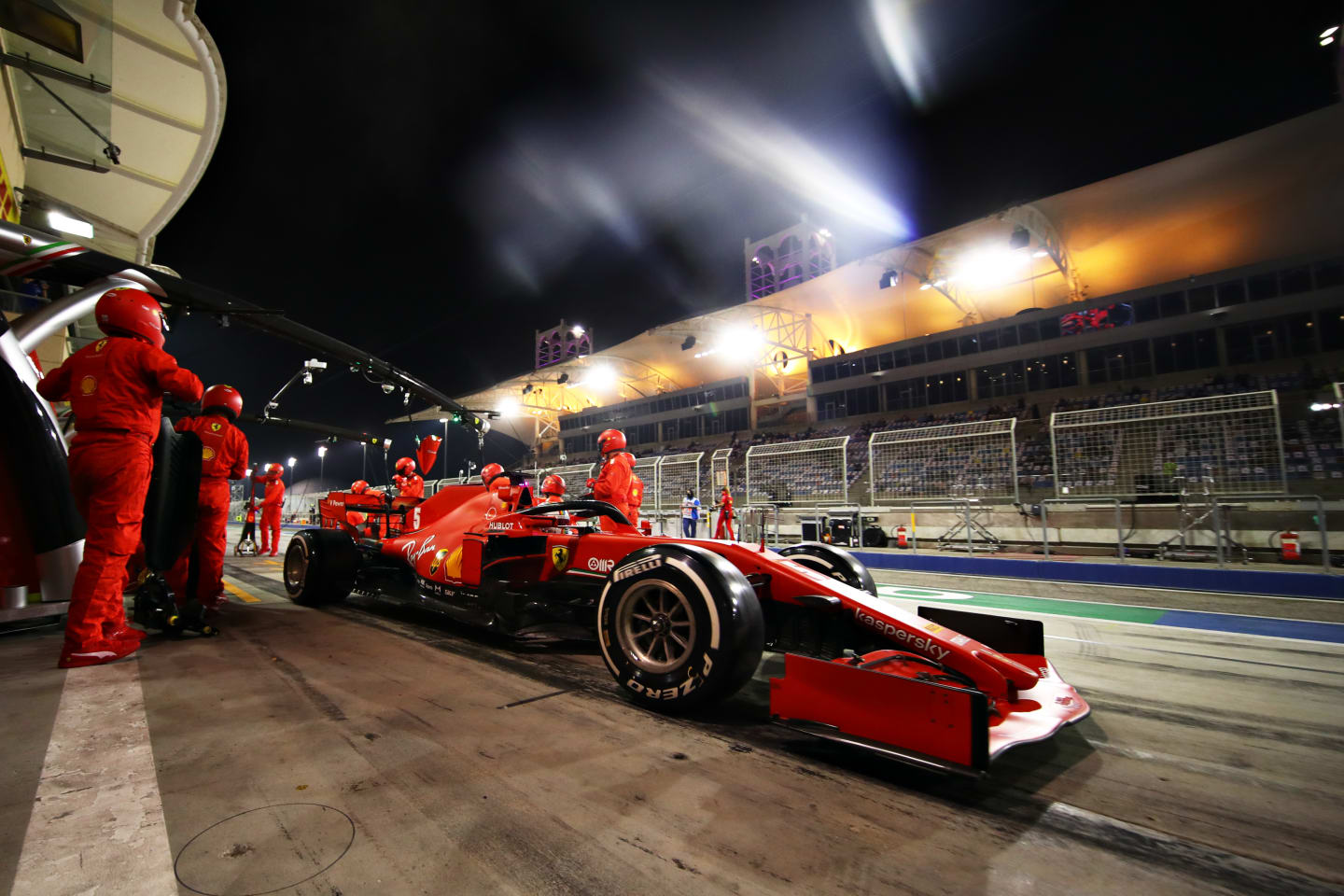 BAHRAIN, BAHRAIN - NOVEMBER 29: Sebastian Vettel of Germany driving the (5) Scuderia Ferrari SF1000 makes a pitstop during the F1 Grand Prix of Bahrain at Bahrain International Circuit on November 29, 2020 in Bahrain, Bahrain. (Photo by Mark Thompson/Getty Images)