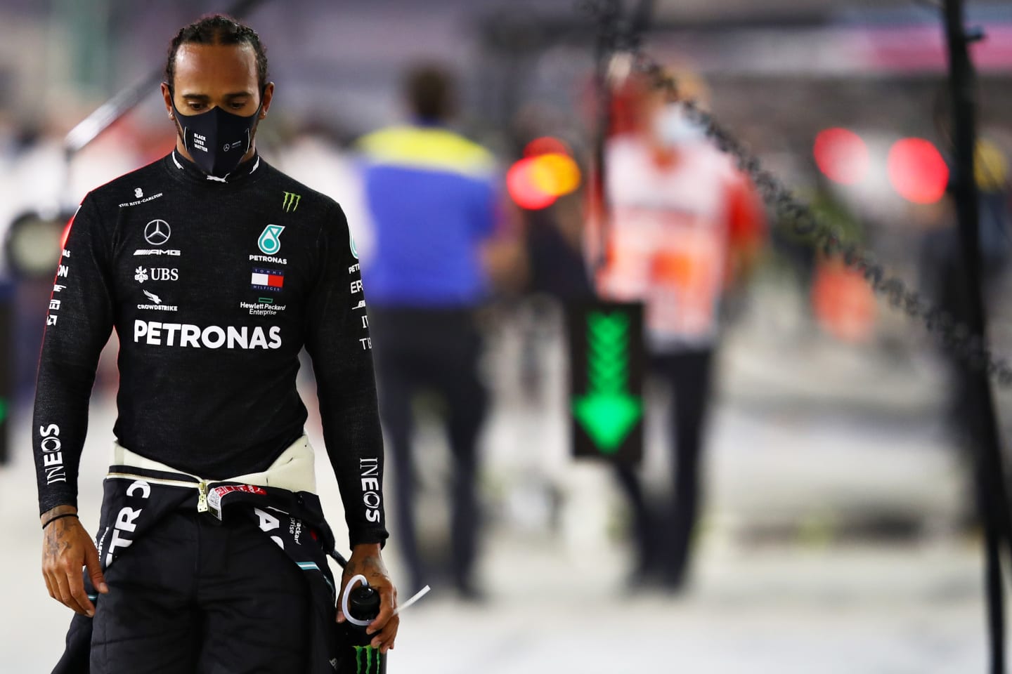 BAHRAIN, BAHRAIN - NOVEMBER 29: Lewis Hamilton of Great Britain and Mercedes GP walks in the
