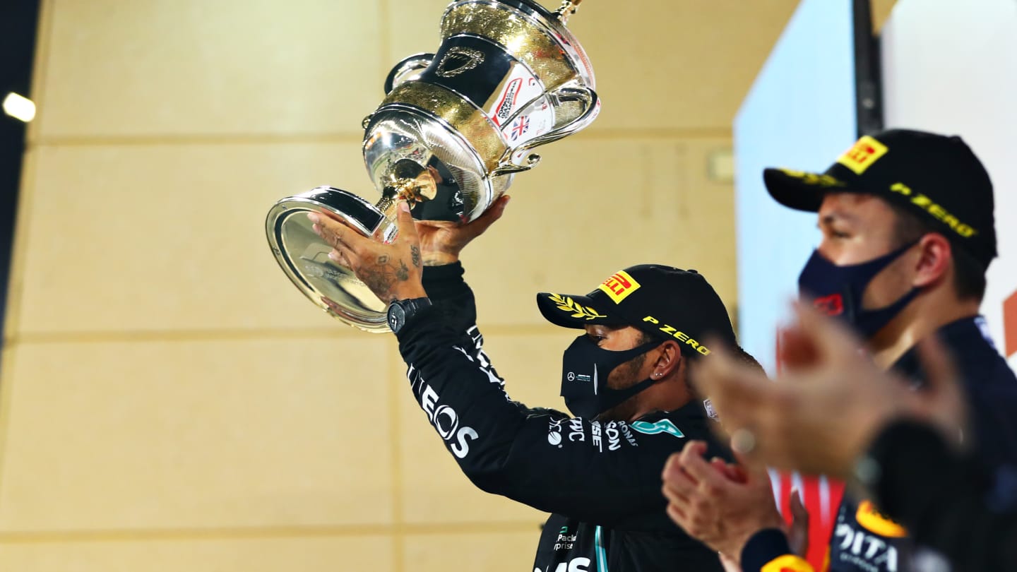 BAHRAIN, BAHRAIN - NOVEMBER 29: Race winner Lewis Hamilton of Great Britain and Mercedes GP