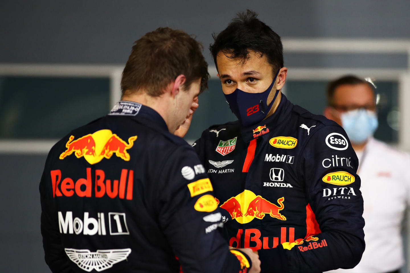 BAHRAIN, BAHRAIN - NOVEMBER 29: Second placed Max Verstappen of Netherlands and Red Bull Racing and third placed Alexander Albon of Thailand and Red Bull Racing celebrate in parc ferme during the F1 Grand Prix of Bahrain at Bahrain International Circuit on November 29, 2020 in Bahrain, Bahrain. (Photo by Mark Thompson/Getty Images)