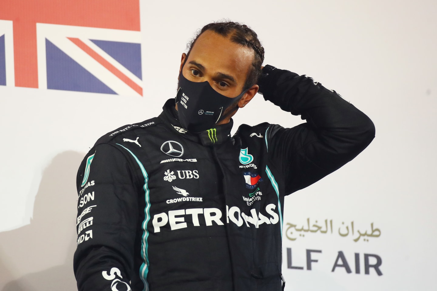 BAHRAIN, BAHRAIN - NOVEMBER 29: Race winner Lewis Hamilton of Great Britain and Mercedes GP celebrates on the podium during the F1 Grand Prix of Bahrain at Bahrain International Circuit on November 29, 2020 in Bahrain, Bahrain. (Photo by Bryn Lennon/Getty Images)