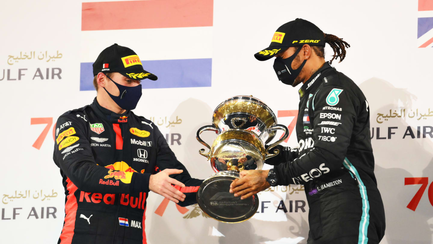 BAHRAIN, BAHRAIN - NOVEMBER 29: Race winner Lewis Hamilton of Great Britain and Mercedes GP, second