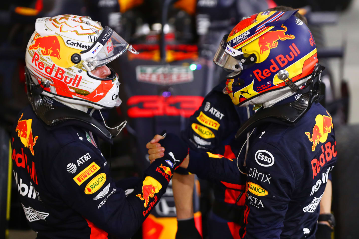 BAHRAIN, BAHRAIN - NOVEMBER 29: Second placed Max Verstappen of Netherlands and Red Bull Racing and third placed Alexander Albon of Thailand and Red Bull Racing celebrate in parc ferme during the F1 Grand Prix of Bahrain at Bahrain International Circuit on November 29, 2020 in Bahrain, Bahrain. (Photo by Dan Istitene - Formula 1/Formula 1 via Getty Images)