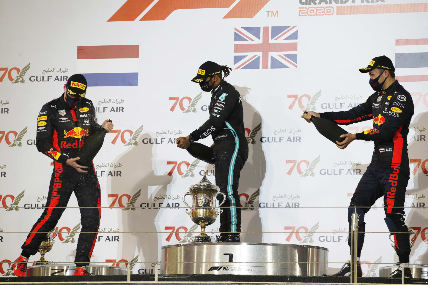 BAHRAIN, BAHRAIN - NOVEMBER 29: Race winner Lewis Hamilton of Great Britain and Mercedes GP, second