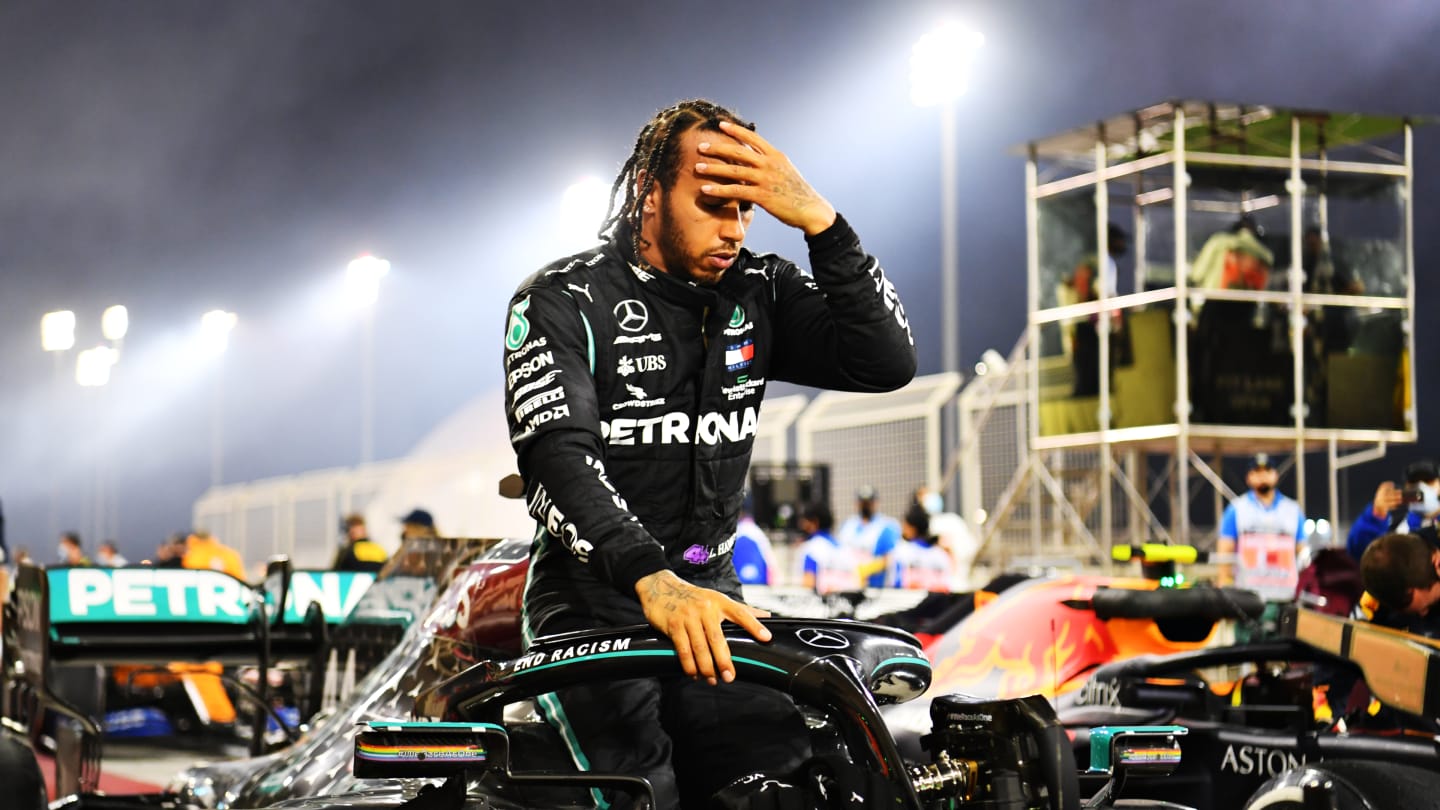 BAHRAIN, BAHRAIN - NOVEMBER 29: Race winner Lewis Hamilton of Great Britain and Mercedes GP