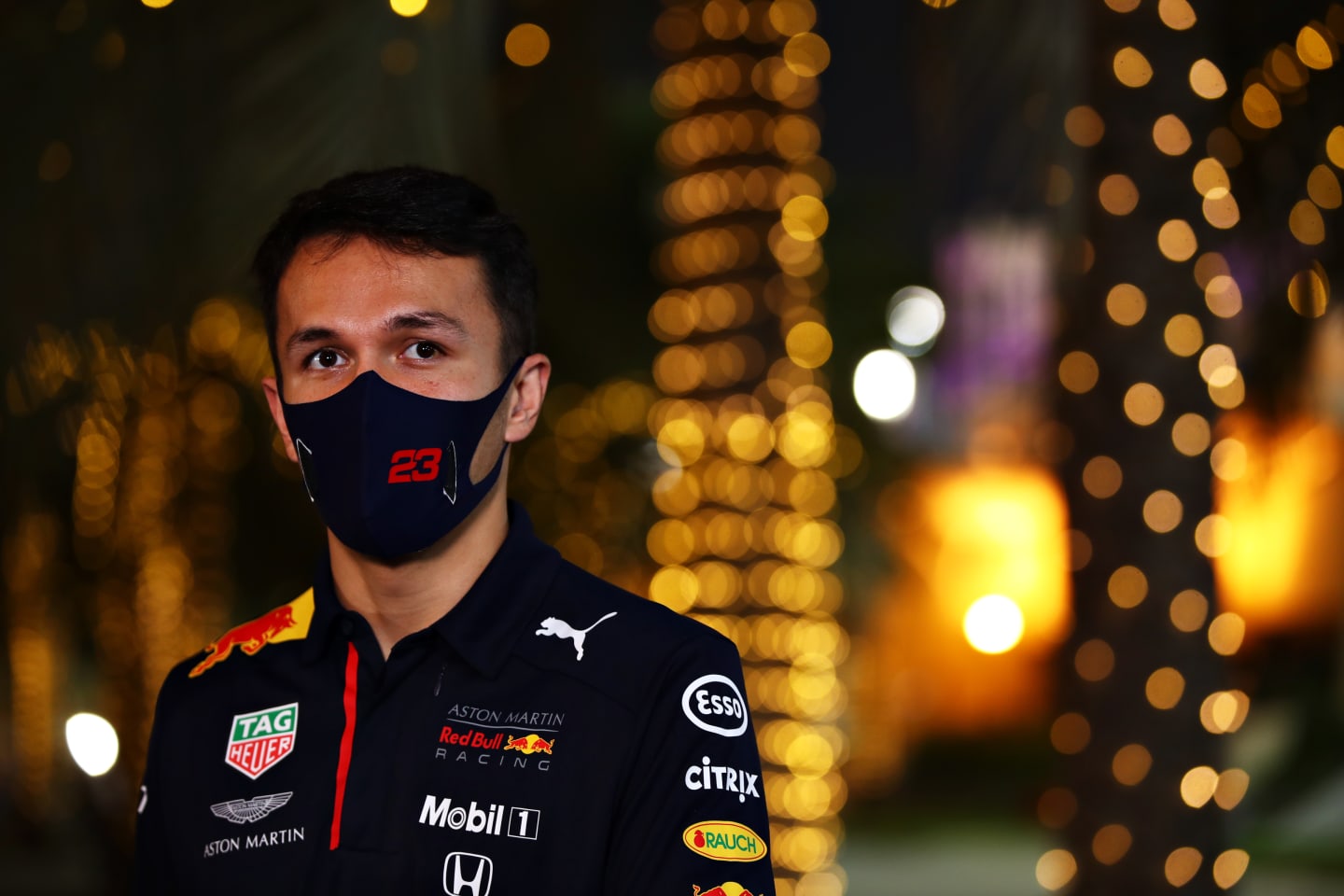 BAHRAIN, BAHRAIN - NOVEMBER 26: Alexander Albon of Thailand and Red Bull Racing talks to the media