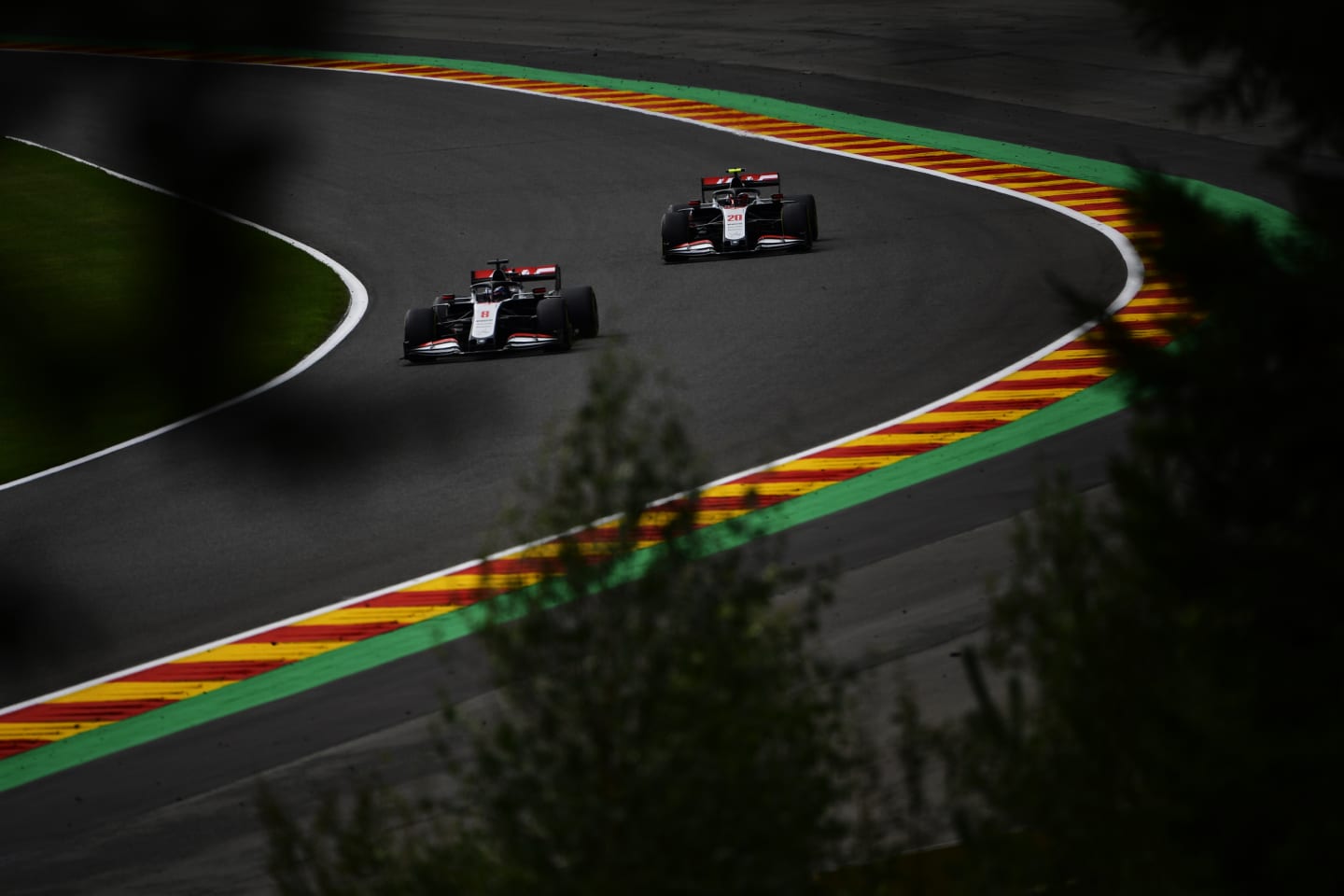 SPA, BELGIUM - AUGUST 29: Romain Grosjean of France driving the (8) Haas F1 Team VF-20 Ferrari leads Kevin Magnussen of Denmark driving the (20) Haas F1 Team VF-20 Ferrari during final practice for the F1 Grand Prix of Belgium at Circuit de Spa-Francorchamps on August 29, 2020 in Spa, Belgium. (Photo by John Thuys/Pool via Getty Images)