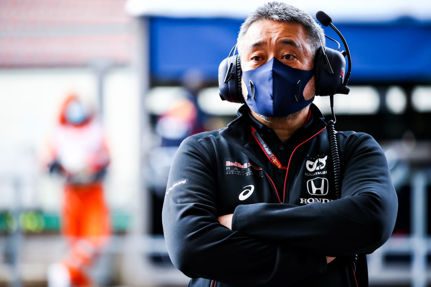 SPA, BELGIUM - AUGUST 29: Masashi Yamamoto of Honda looks on outside the Red Bull Racing garage