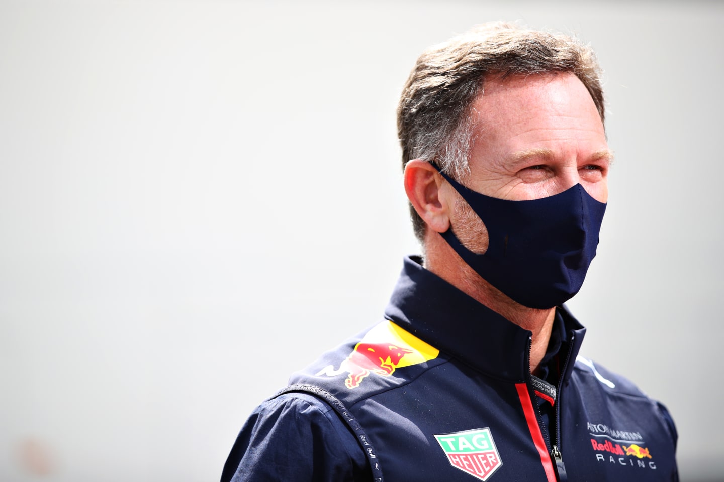 SPA, BELGIUM - AUGUST 30: Red Bull Racing Team Principal Christian Horner looks on in the Paddock