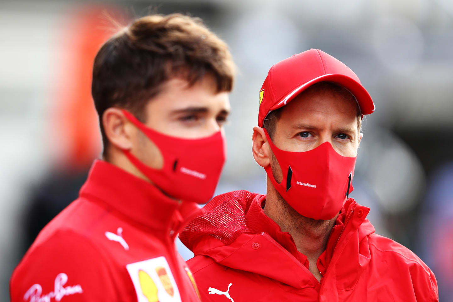 SPA, BELGIUM - AUGUST 30: Sebastian Vettel of Germany and Ferrari and Charles Leclerc of Monaco and