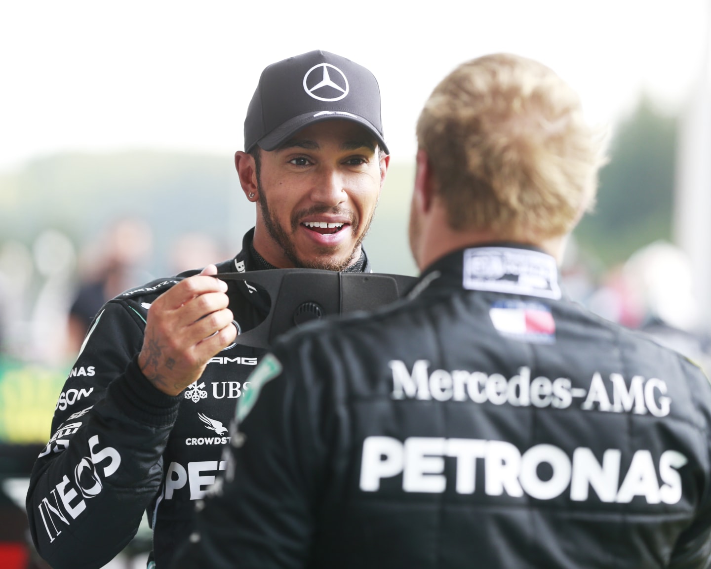 SPA, BELGIUM - AUGUST 30: Race winner Lewis Hamilton of Great Britain and Mercedes GP speaks with